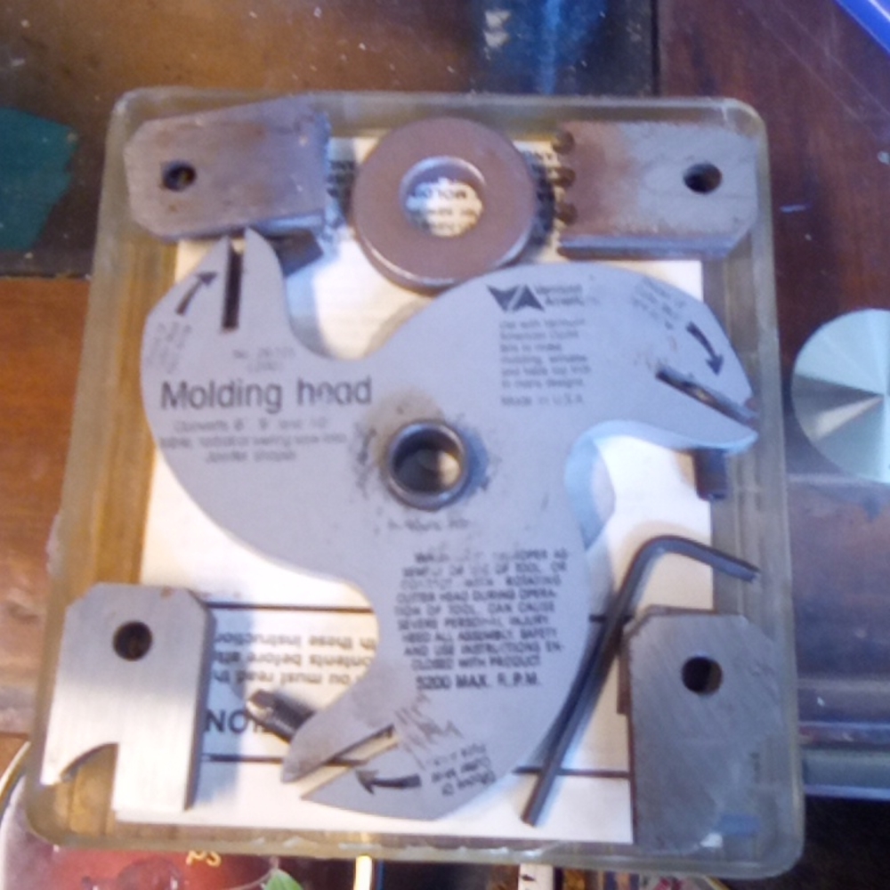 Crown molding cutter head